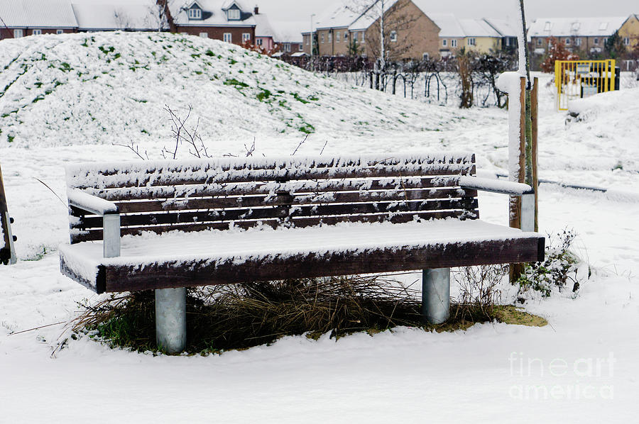 Winter Photograph - Snow on a bench by Tom Gowanlock