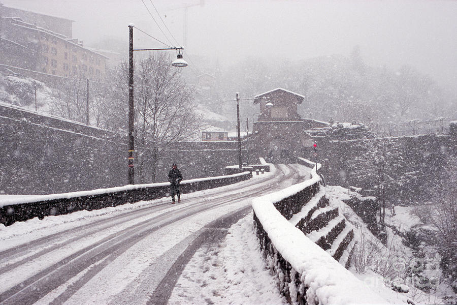 Snow on the road to Bergamo Photograph by Riccardo Mottola