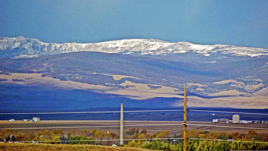 Snow-topped Peaks of Rocky Mountains near Laramie, Wyoming Photograph by Ruth Hager