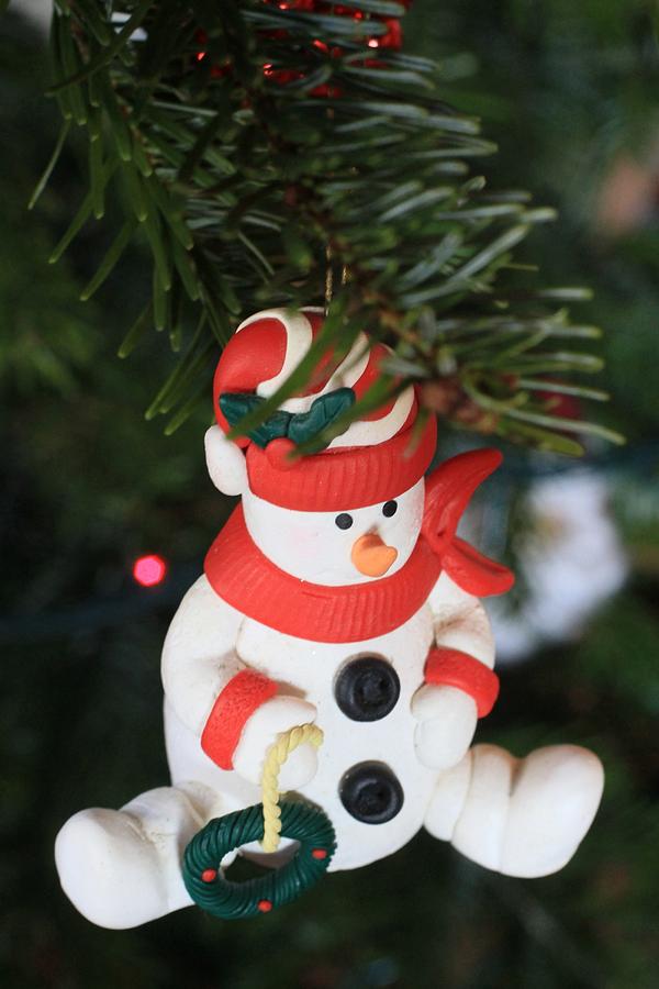 Christmas Photograph - Snowman on a Christmas tree  by American School