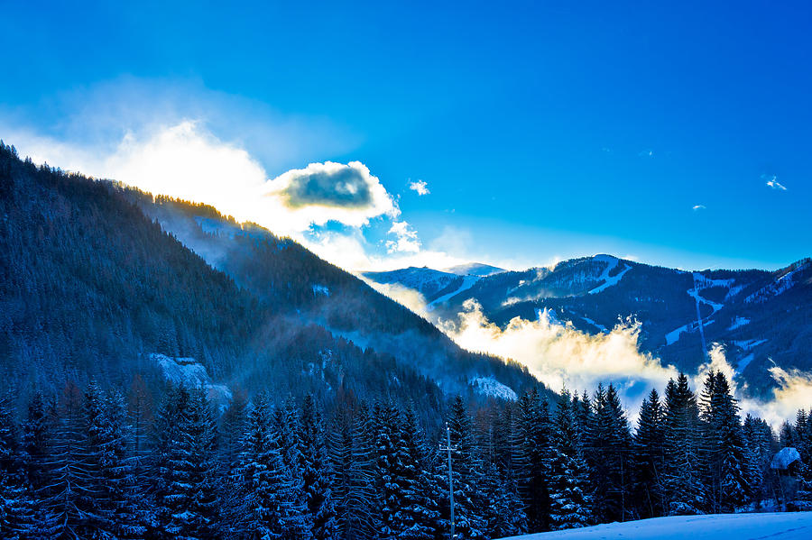 Snowy Austrian Alps in morning clouds Photograph by Brch Photography