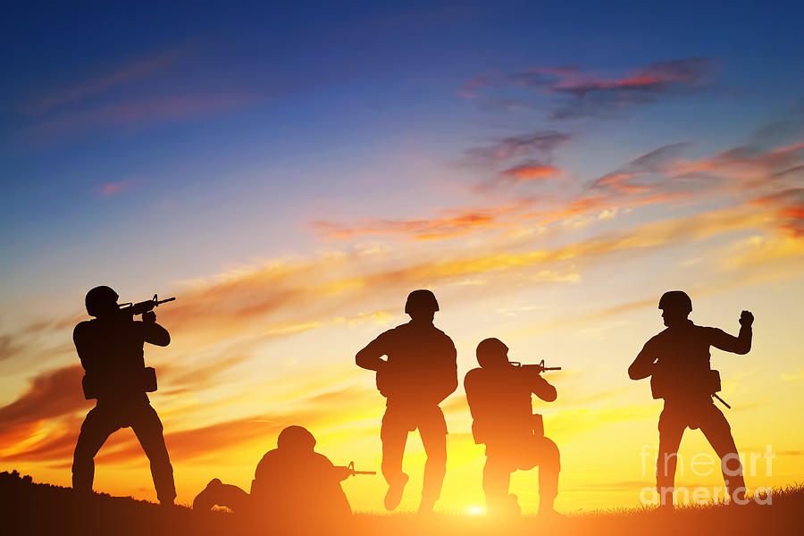 Sunset Photograph - Soldiers in assault by Michal Bednarek