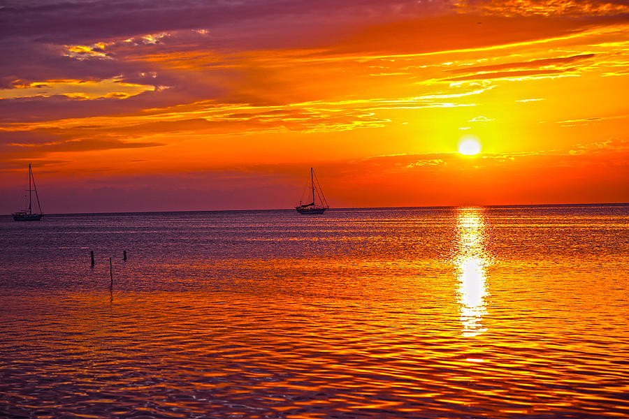 Solitary Sunset Caye Caulker Belize Photograph by Lee Vanderwalker