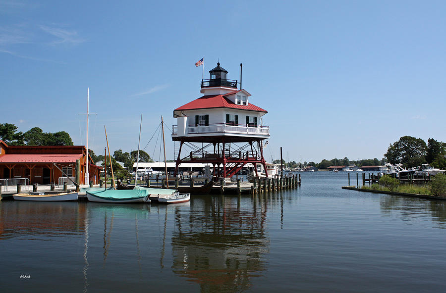 Solomons Island - Drum Point Lighthouse Reflecting Photograph by Ronald Reid