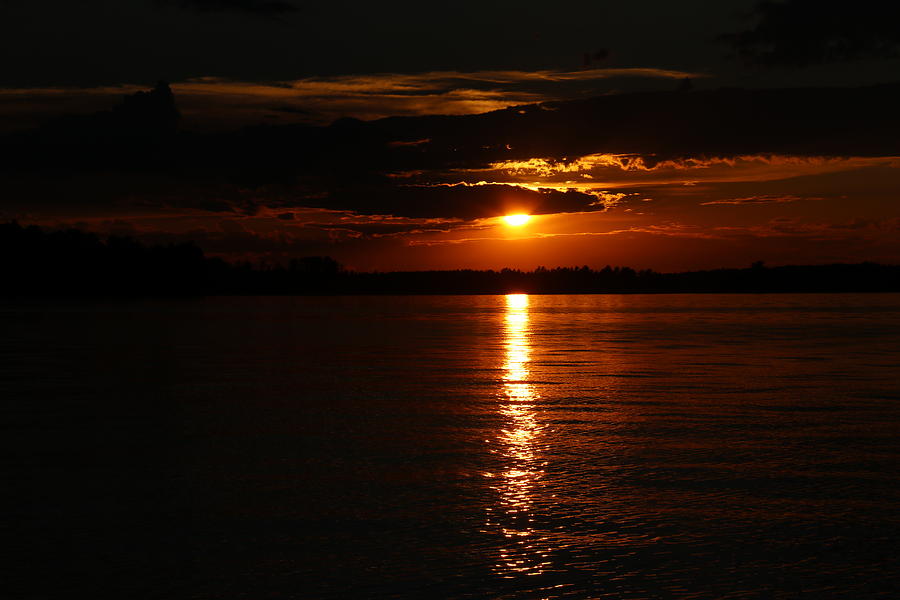 Solstice Sunset Photograph by Hans Brakob