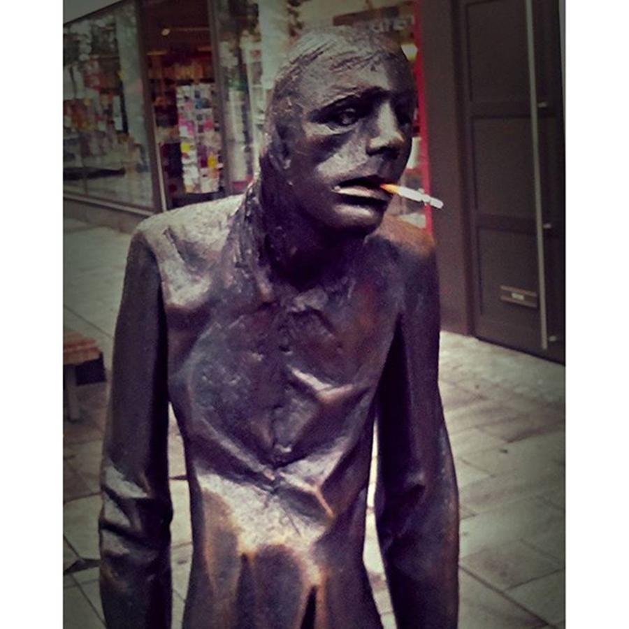 Beautiful Photograph - Someone Put A Cigarette In This Bronze by Photografree Studios