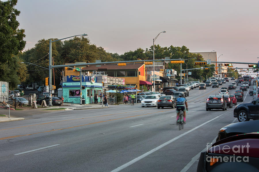 Rush Hour Movie Photograph - South Congress Avenue is a vibrant neighborhood full of eclectic boutiques, restaurants and live music venues by Dan Herron