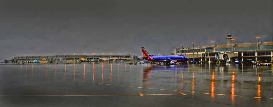 Southwest Plane in the Rain Photograph by Don Wolf