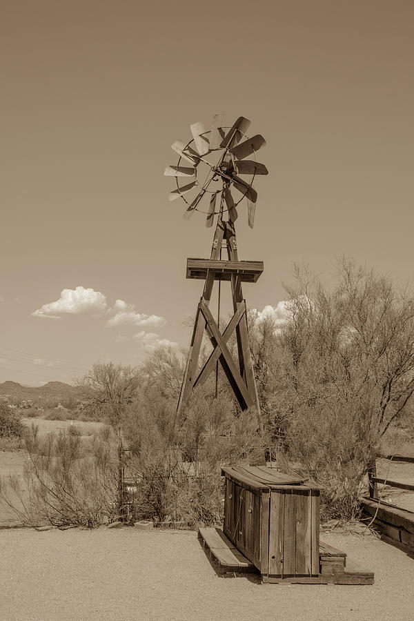 Southwest windmill Photograph by Darrell Foster