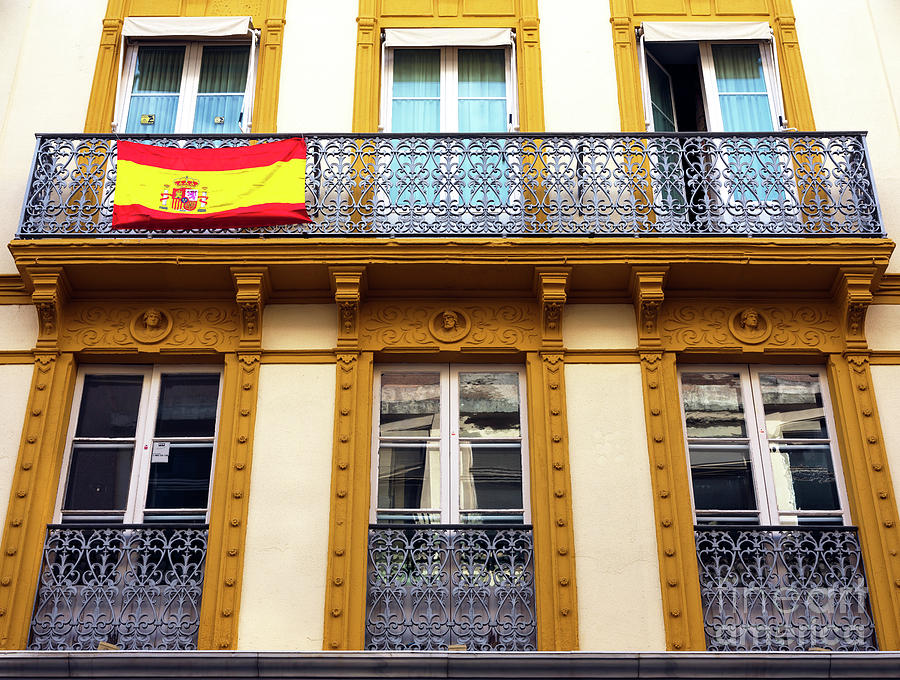 Spanish Pride in Seville Photograph by John Rizzuto