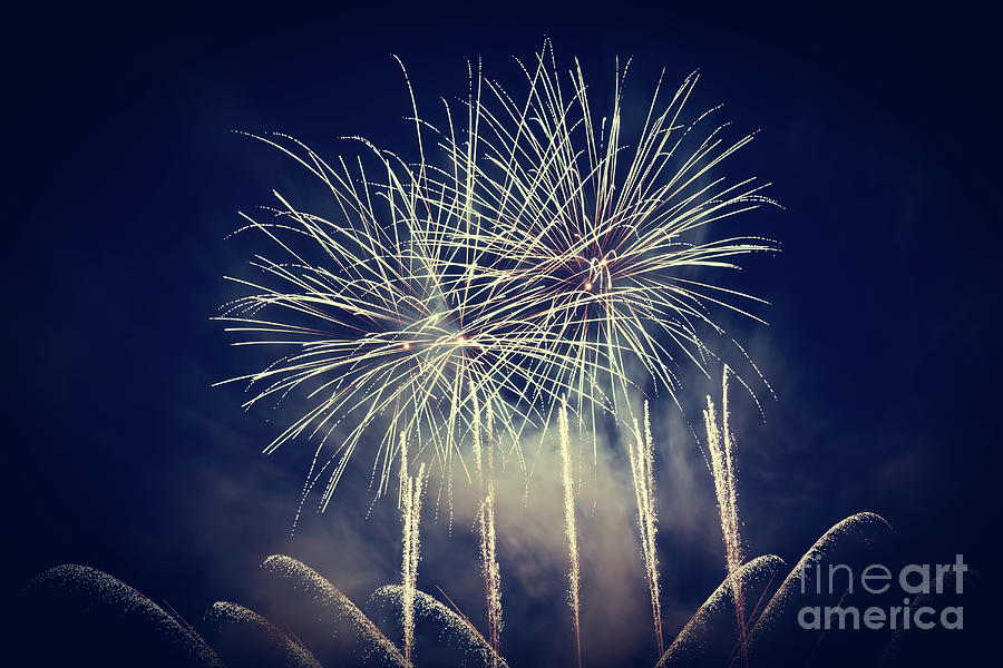 Spectacular fireworks show light up the sky. New year celebration. Photograph by Michal Bednarek