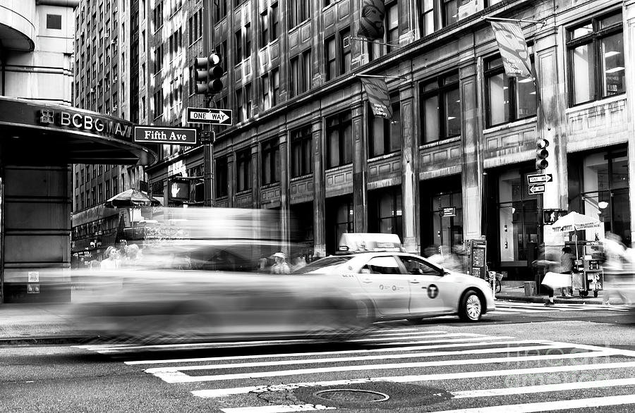 Speed in New York City Photograph by John Rizzuto