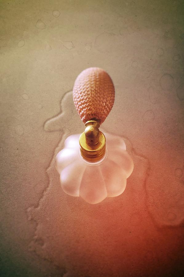 Spilled Perfume 2 Photograph by Carlos Caetano