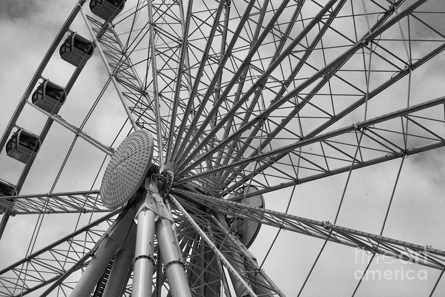 Black And White Photograph - Spining Wheel  by John S