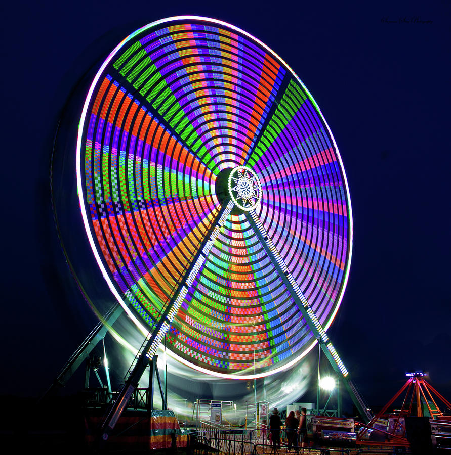 Spinning Ferris Wheel Photograph by Suzanne Stout