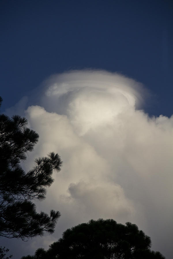 Clouds Photograph - Spinning Top by Nancy Dinsmore