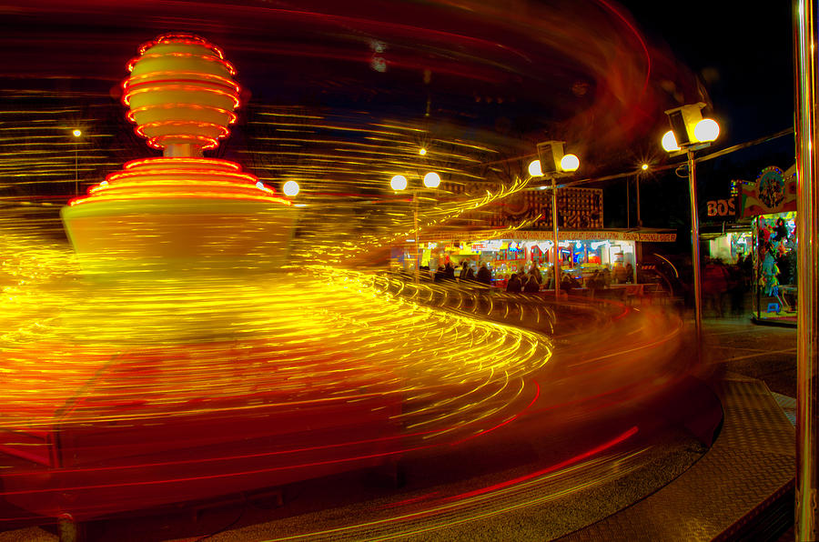 Spinning until youre dizzy Photograph by Wolfgang Stocker