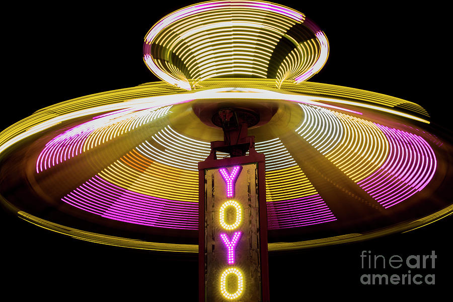 Spinning YoYo Ride Photograph by Juli Scalzi