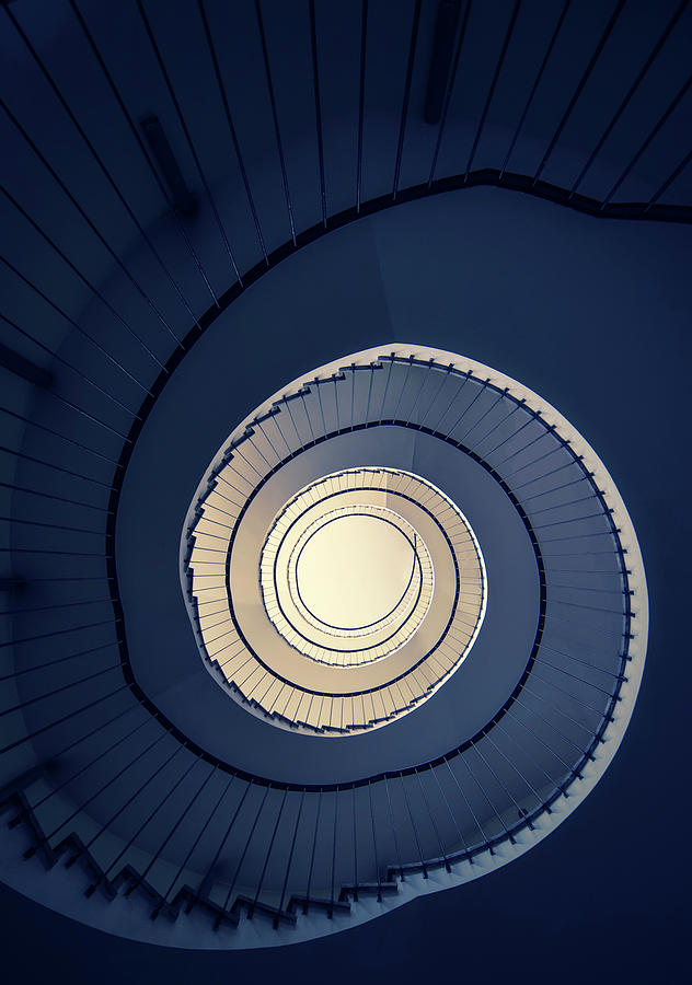 Architecture Photograph - Spiral staircase in blue and cream tones by Jaroslaw Blaminsky