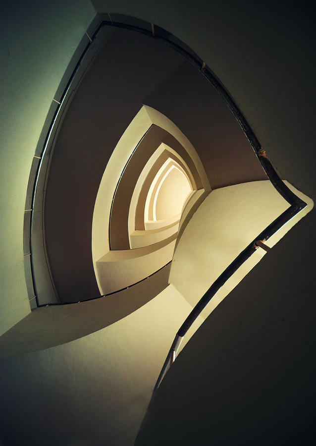 Spiral staircase in brown and cream colors Photograph by Jaroslaw Blaminsky
