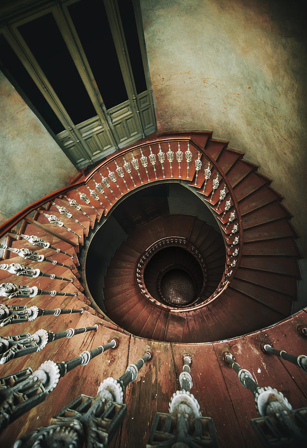 Architecture Photograph - Spiral staircase in red and brown tones by Jaroslaw Blaminsky