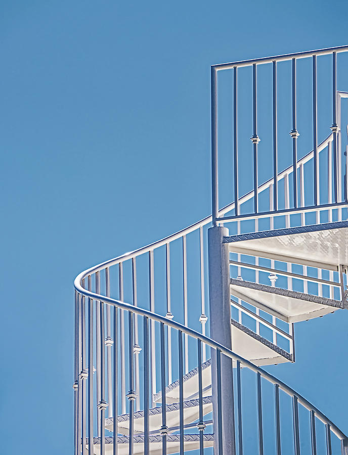 Spiral Staircase On Blue Sky Photograph by Gary Slawsky