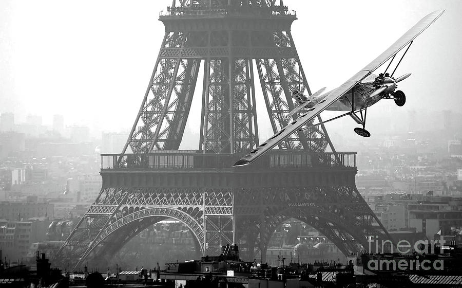 Spirit of St. Louis flies past the Eiffel Tower  Photograph by Doc Braham