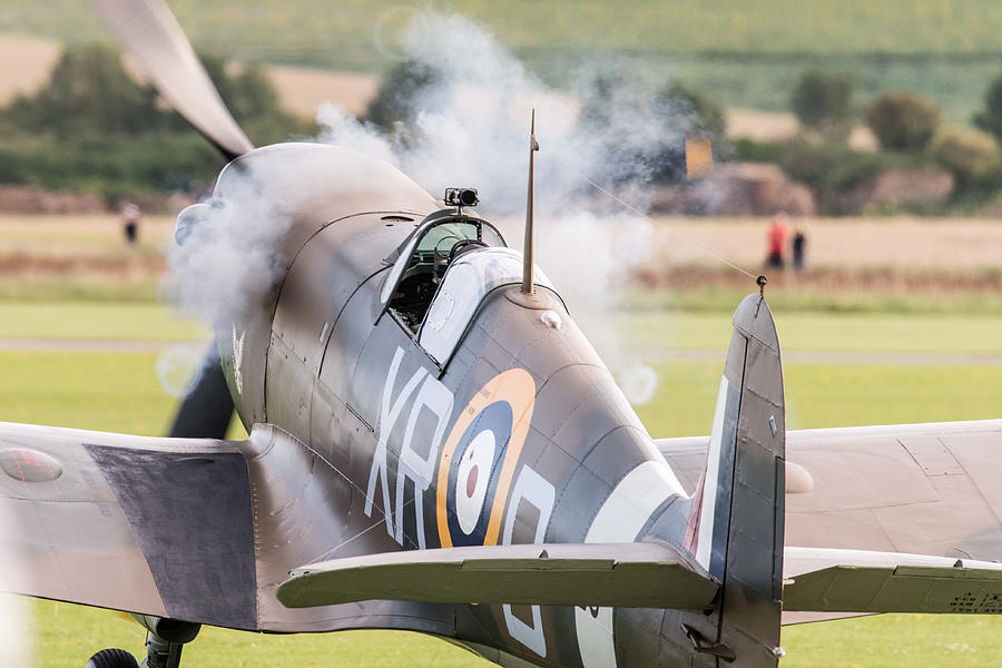 Airshow Photograph - Spitfire engine start smoke rings by Gary Eason