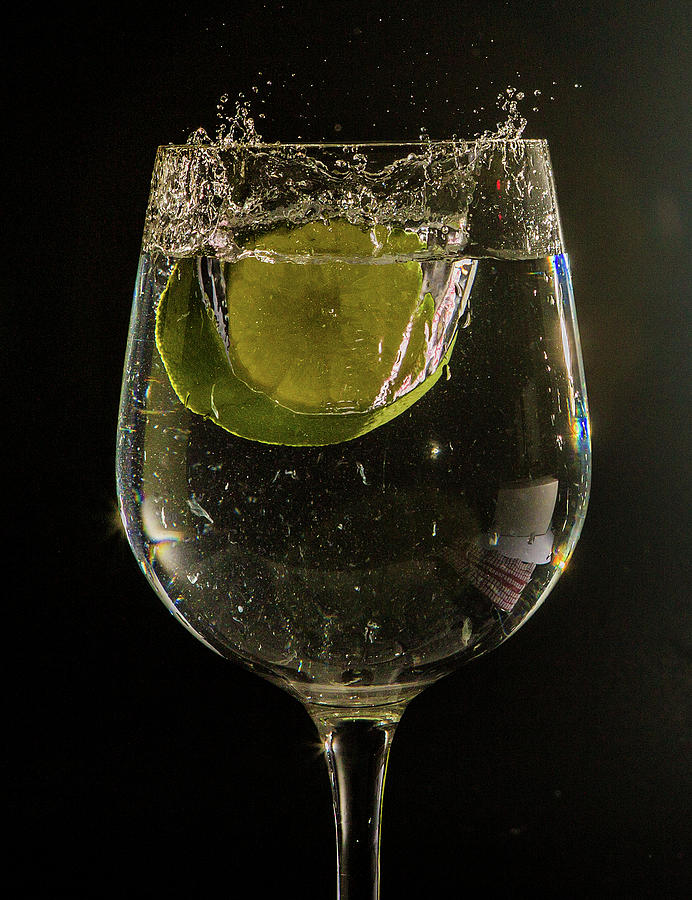 Splash of lime Photograph by Ed James