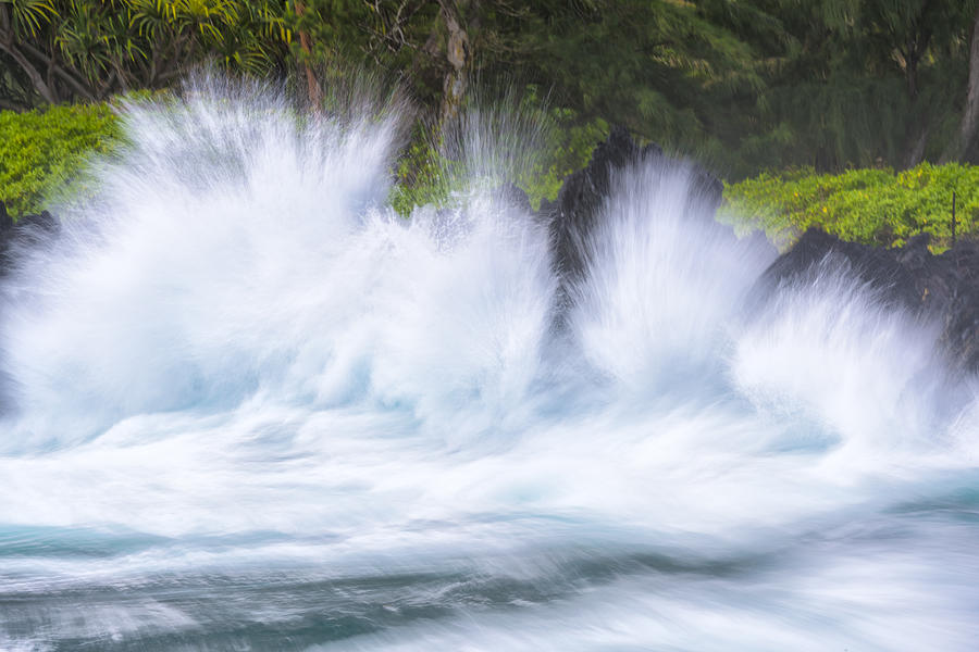 Splashes Photograph by Jon Glaser