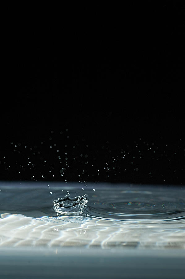 Splashing water Photograph by Dan Friend