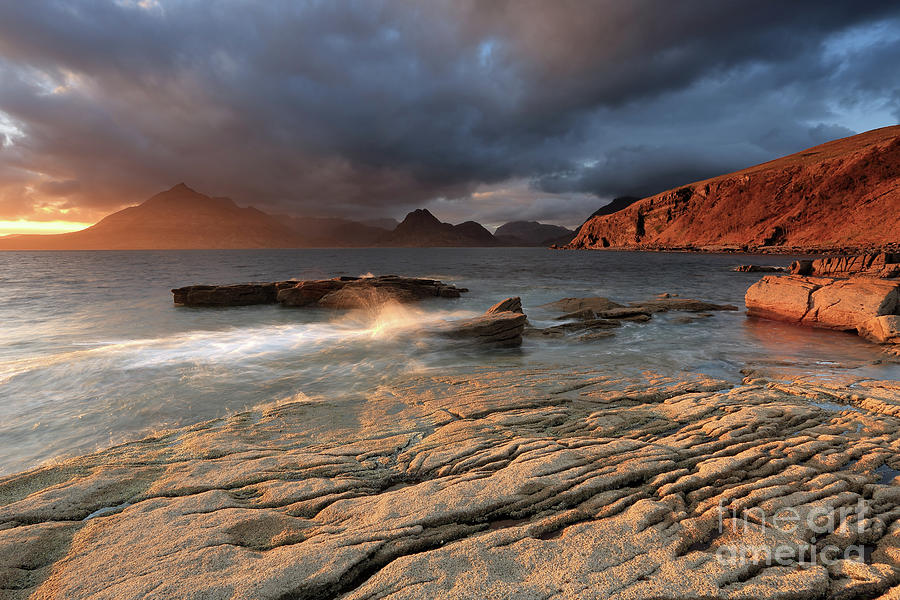 Sunset Photograph - Splashing waves and the Cuillins at Sunset by Maria Gaellman