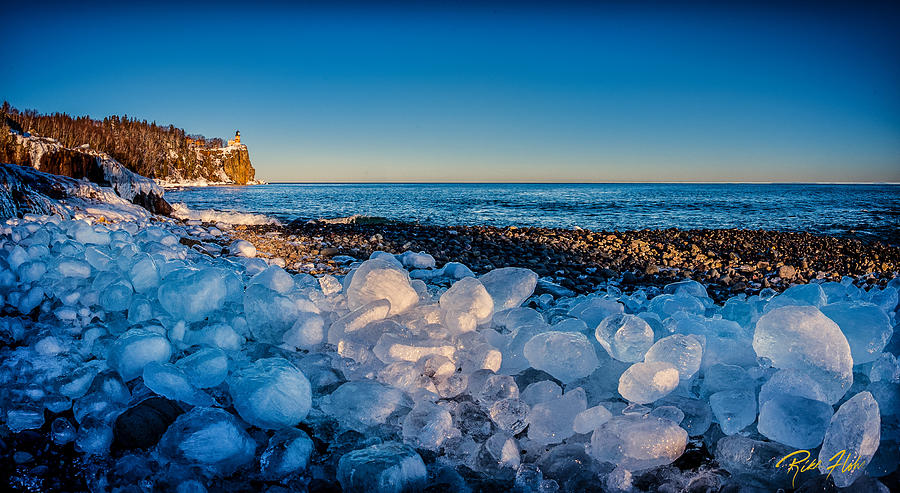 Split Rock Lighthouse with Ice Balls Photograph by Rikk Flohr