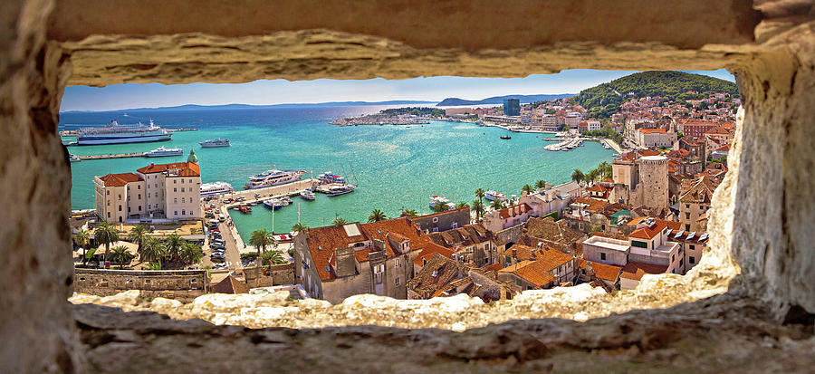 Split waterfront aerial panoramic view through stone window Photograph by Brch Photography