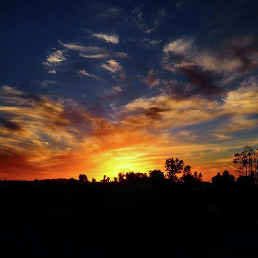 Sunset Photograph - Spooktacular Clouds by J Lopez