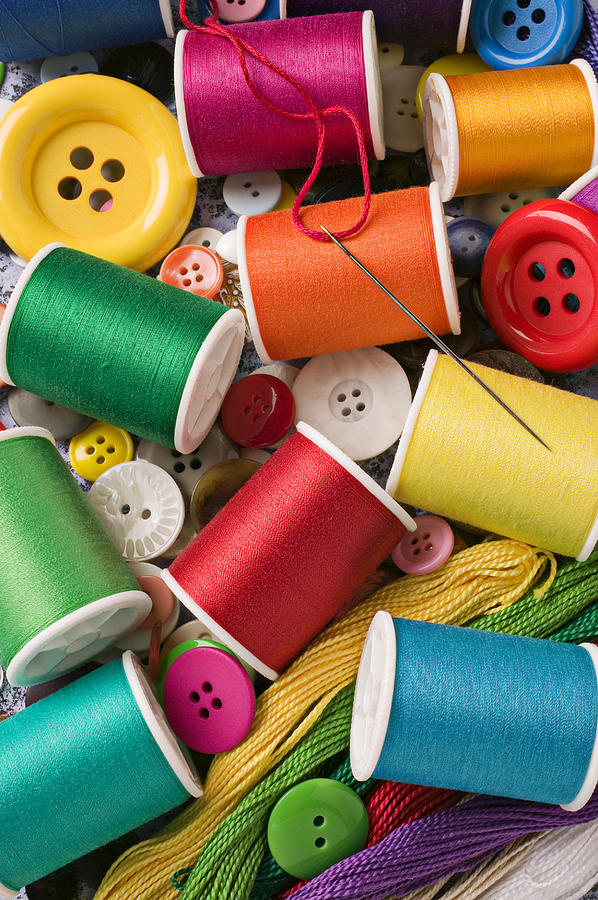 Spools of thread with buttons Photograph by Garry Gay