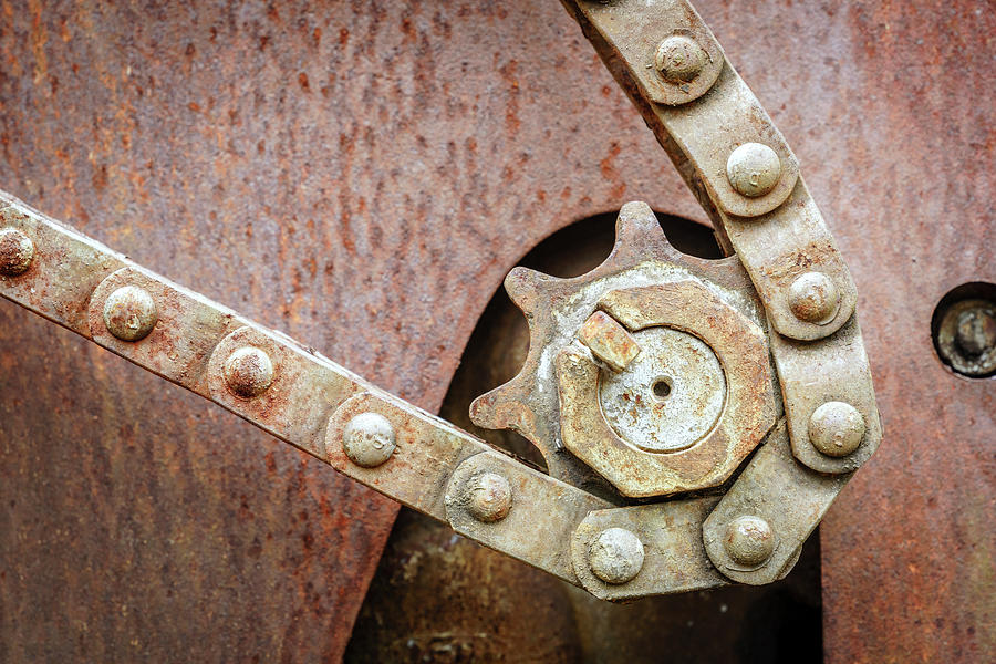 Sprocket and chain Photograph by Alexey Stiop