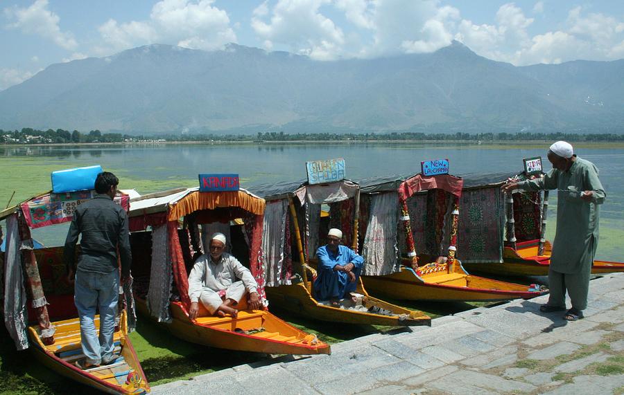 Boatman Photograph - Srinagar by Mohammed Nasir