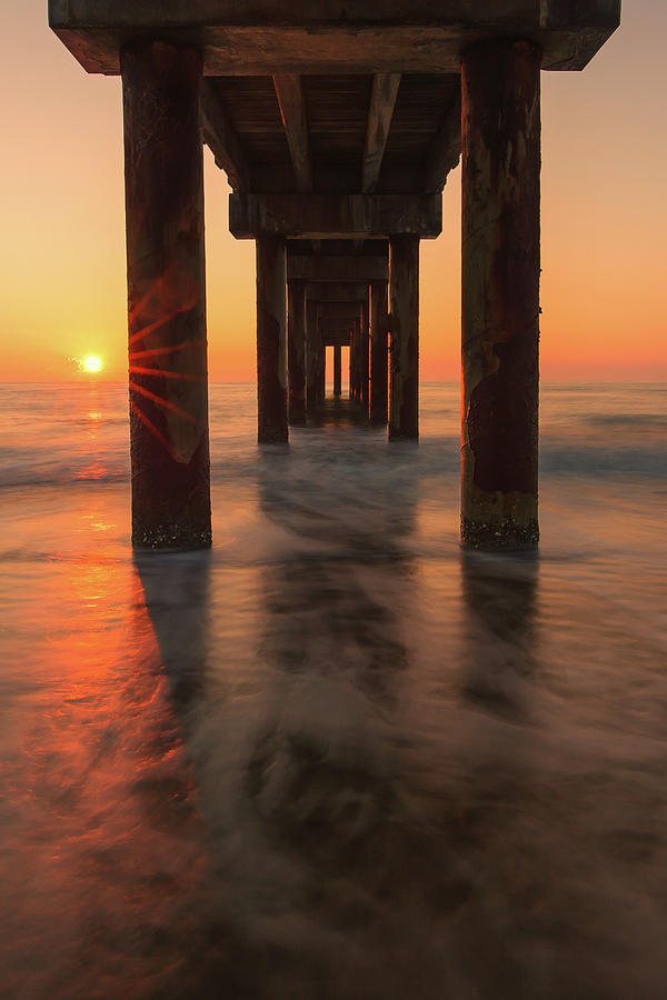 St Augustine Beach Pier Sunrise Reflection Photograph by Stefan Mazzola