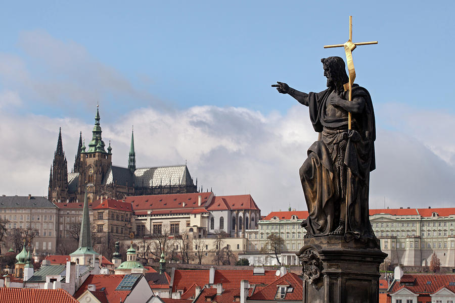St. John the Baptist Statue and Prague Castle Photograph by Aivar Mikko