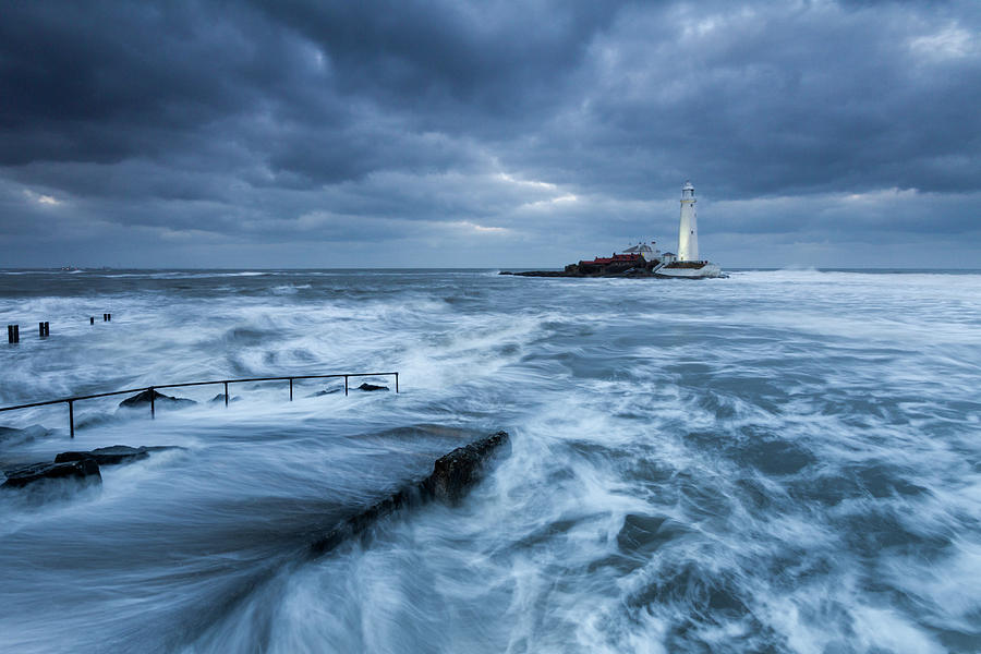 St Marys Lighthouse and the cold North Sea Photograph by Anita Nicholson