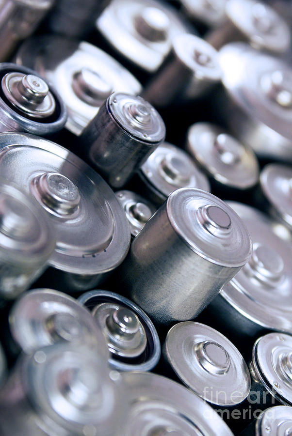 Abstract Photograph - Stack Of Batteries by Carlos Caetano
