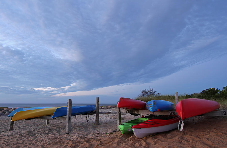 Stacked Kayaks Photograph by Juergen Roth