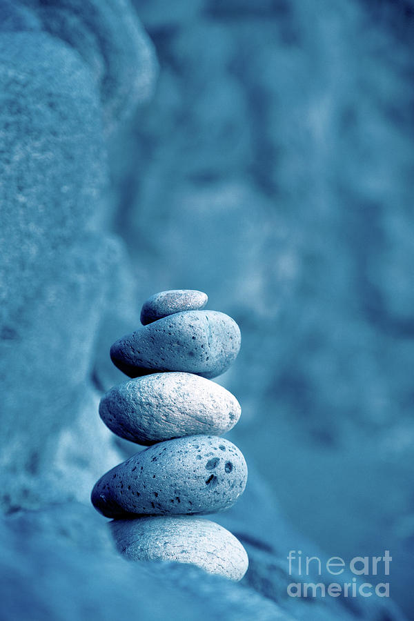 Stacked pebbles Photograph by Gaspar Avila