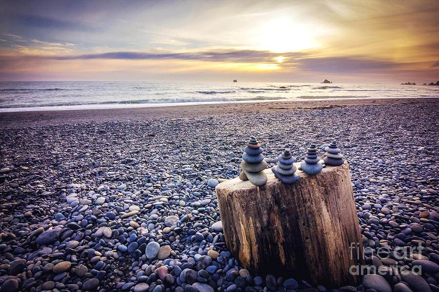 Sunset Photograph - Stacked Rocks at Sunset by Joan McCool