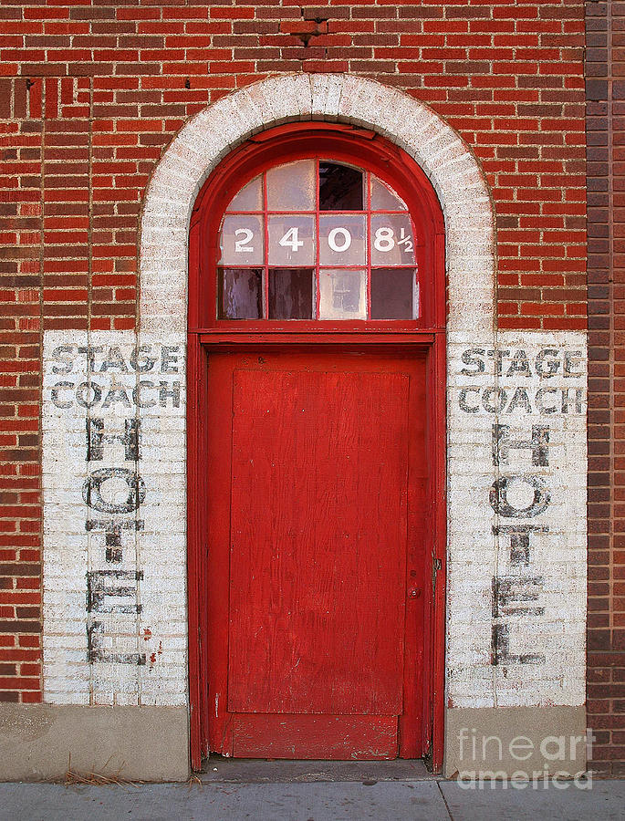 Stagecoach Hotel - rustic antique red door home country southwest Photograph by Jon Holiday