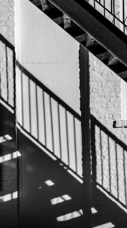 Black And White Photograph - Stairs Railings And Shadows by Gary Slawsky