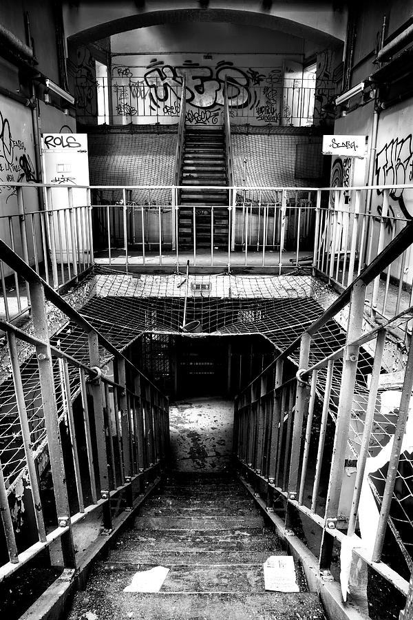 Stairway to the belly of jail - urban exploration Photograph by Dirk Ercken
