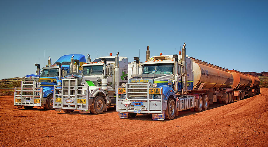 Standing road trains Photograph by Martin Capek