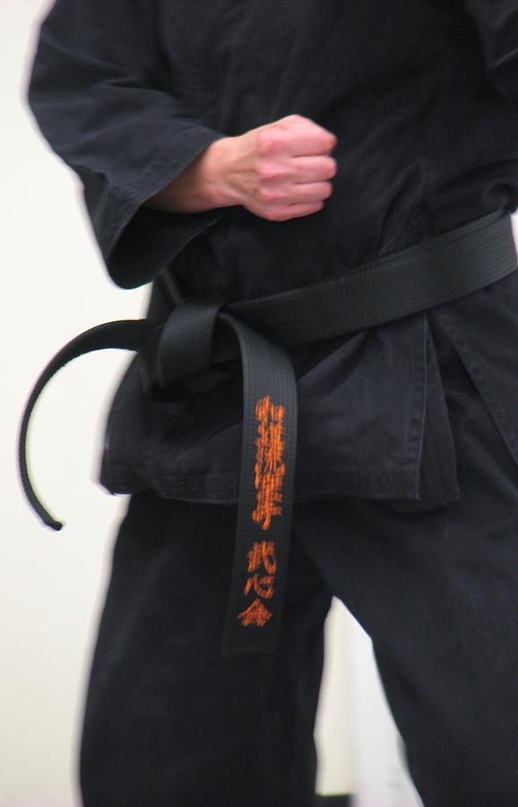 Karate Photograph - Stands With Fist by Kelly Mezzapelle